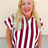 Off-white and garnet striped knit top with collared neckline and relaxed drop short sleeves.