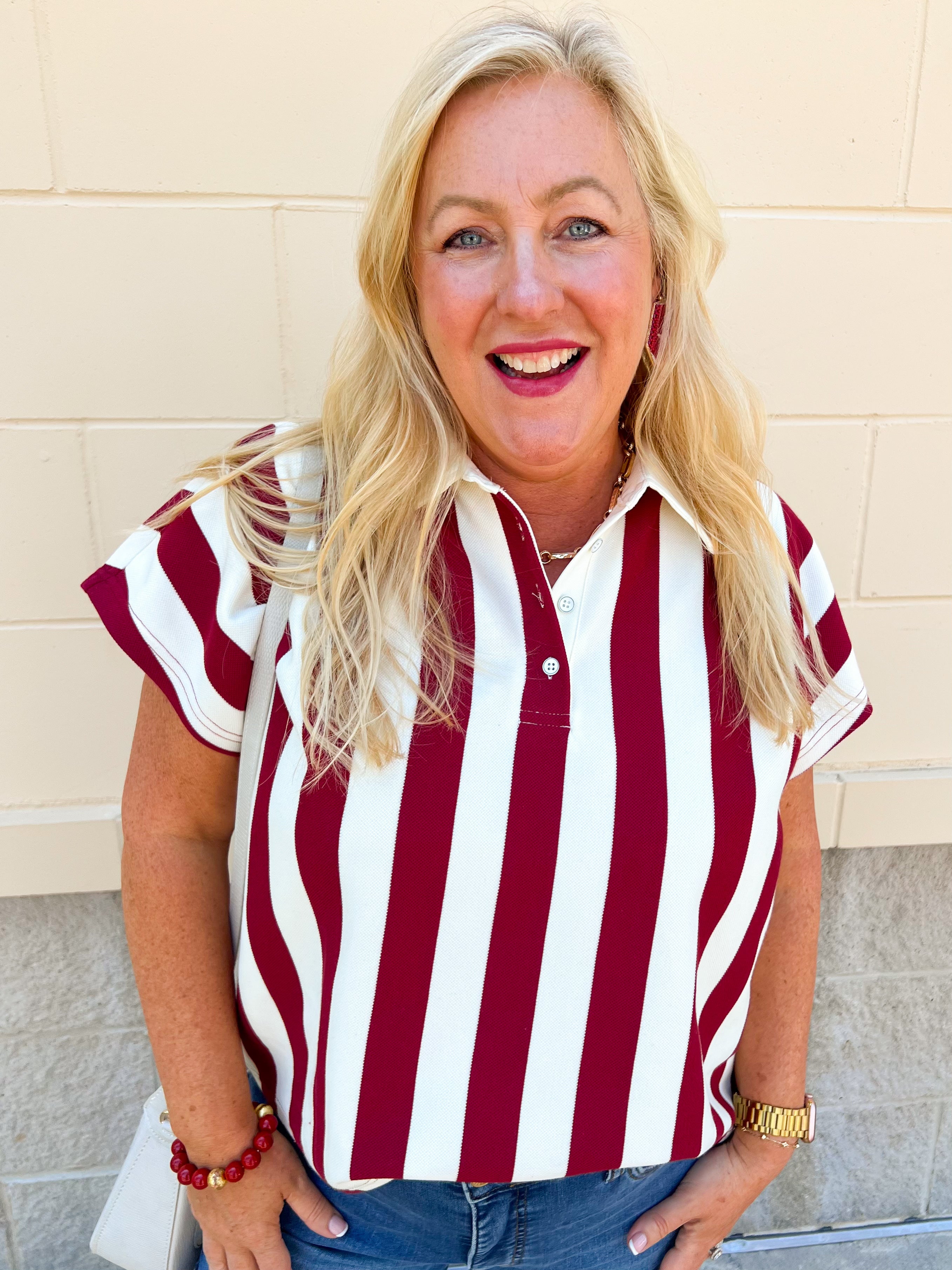 Off-white and garnet striped knit top with collared neckline and relaxed drop short sleeves.