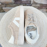 Neutral woven Corkys lace-up sneakers with side stripe detail, cushioned sole, and low-top silhouette in a versatile white combo colorway.