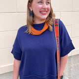 Navy half sleeve crew neck sweater top with thick stitched hems and relaxed silhouette.