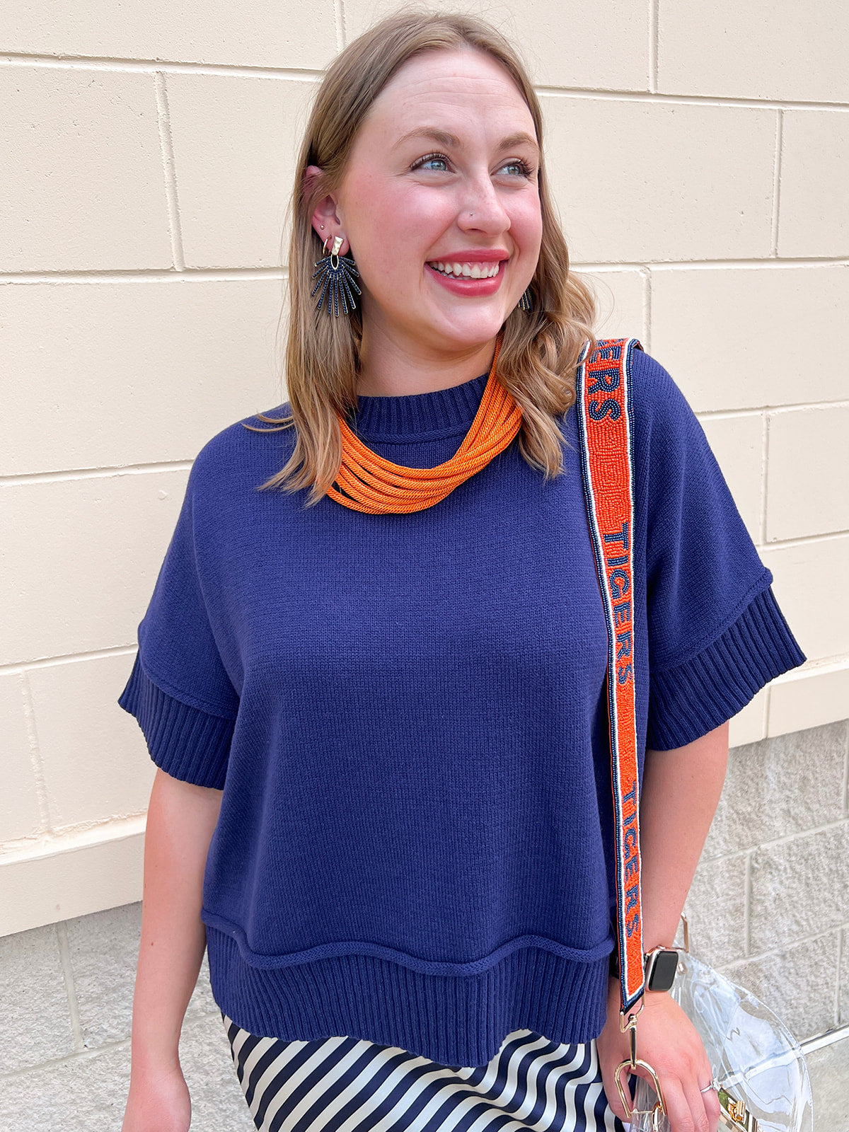 Navy half sleeve crew neck sweater top with thick stitched hems and relaxed silhouette.