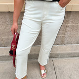 White mid-rise straight leg jeans with a black side stripe, stretch denim, and a clean hem.