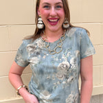 Dusty blue short sleeve top with watercolor floral pattern