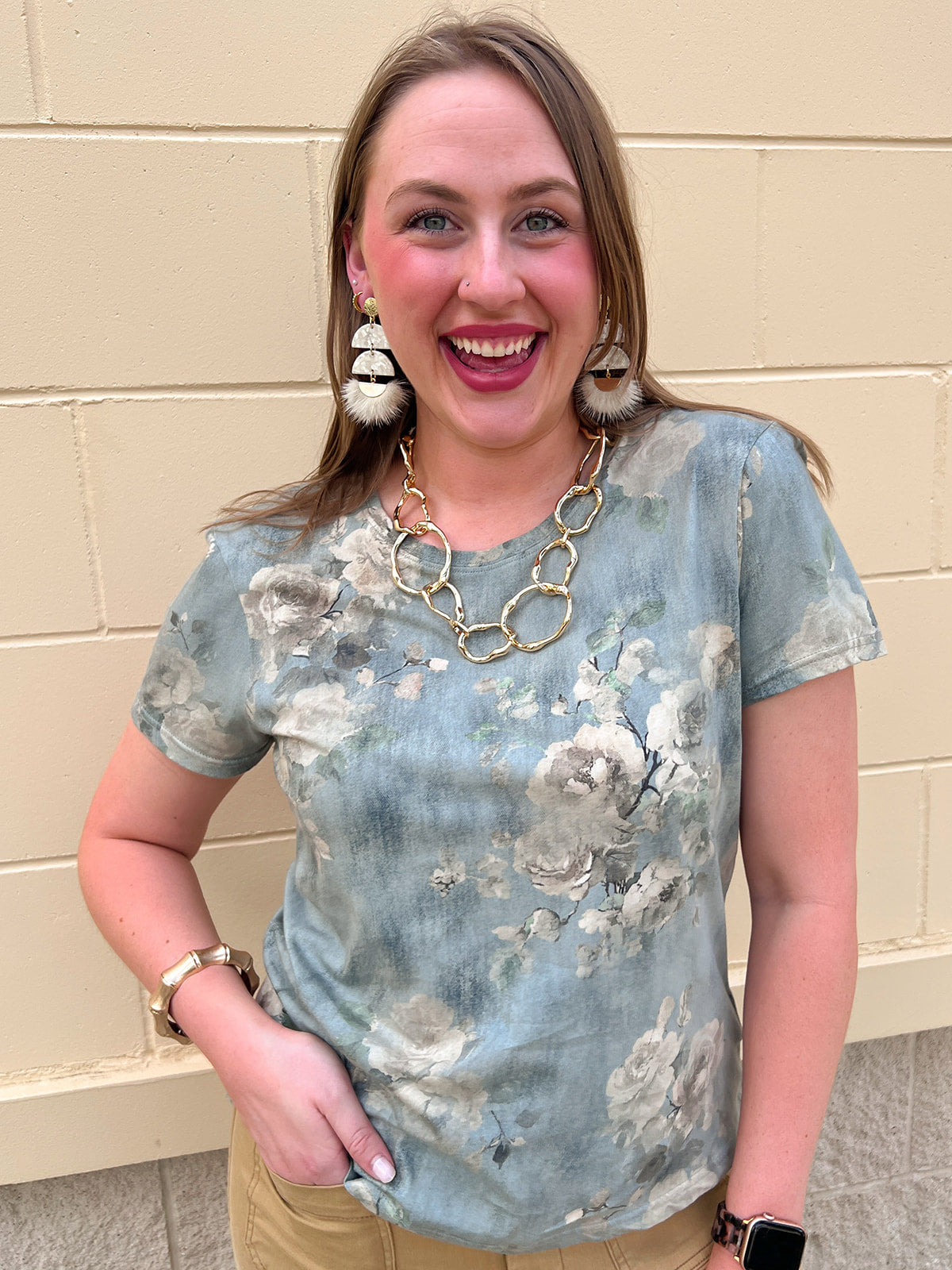 Dusty blue short sleeve top with watercolor floral pattern