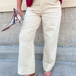 High-rise straight-leg jeans in a sand stripe pattern with clean hem and classic silhouette.