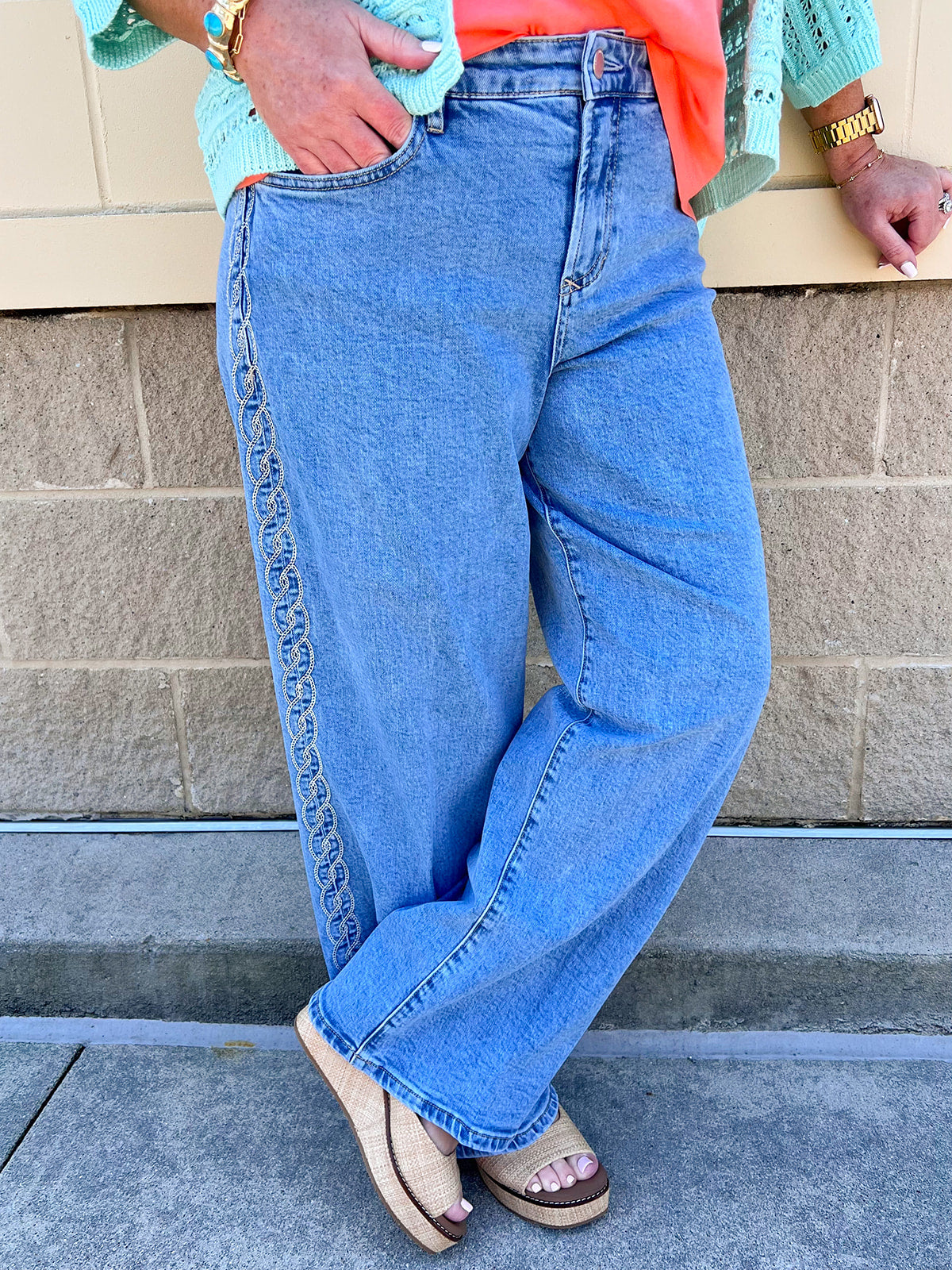 Light wash high rise jeans with braided side detail