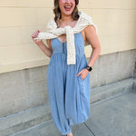 Daydream Denim Jumpsuit in classic denim with thin straps and button detail