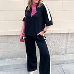 Black matching lounge set with cream stripe detail