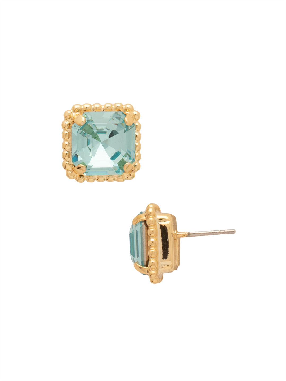 Bright gold-tone stud earrings with aquamarine square-cut crystals and a metal beaded halo from Sorrelli’s Aquamarine Collection.