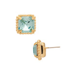 Bright gold-tone stud earrings with aquamarine square-cut crystals and a metal beaded halo from Sorrelli’s Aquamarine Collection.