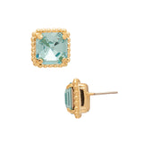 Bright gold-tone stud earrings with aquamarine square-cut crystals and a metal beaded halo from Sorrelli’s Aquamarine Collection.
