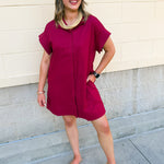 Lightweight cotton linen mini dress featuring short sleeves, a relaxed silhouette, hidden button front placket, side pockets, and a classic woven texture for an effortless everyday look.