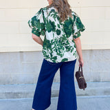  [Entro] Forest Floral Blouse featuring a cream background and dark green floral pattern.