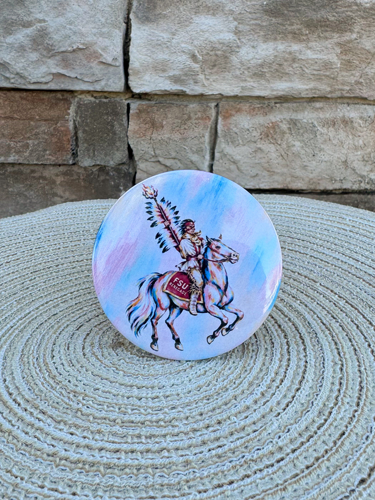 3-inch FSU Renegade watercolor gameday pin with pastel background