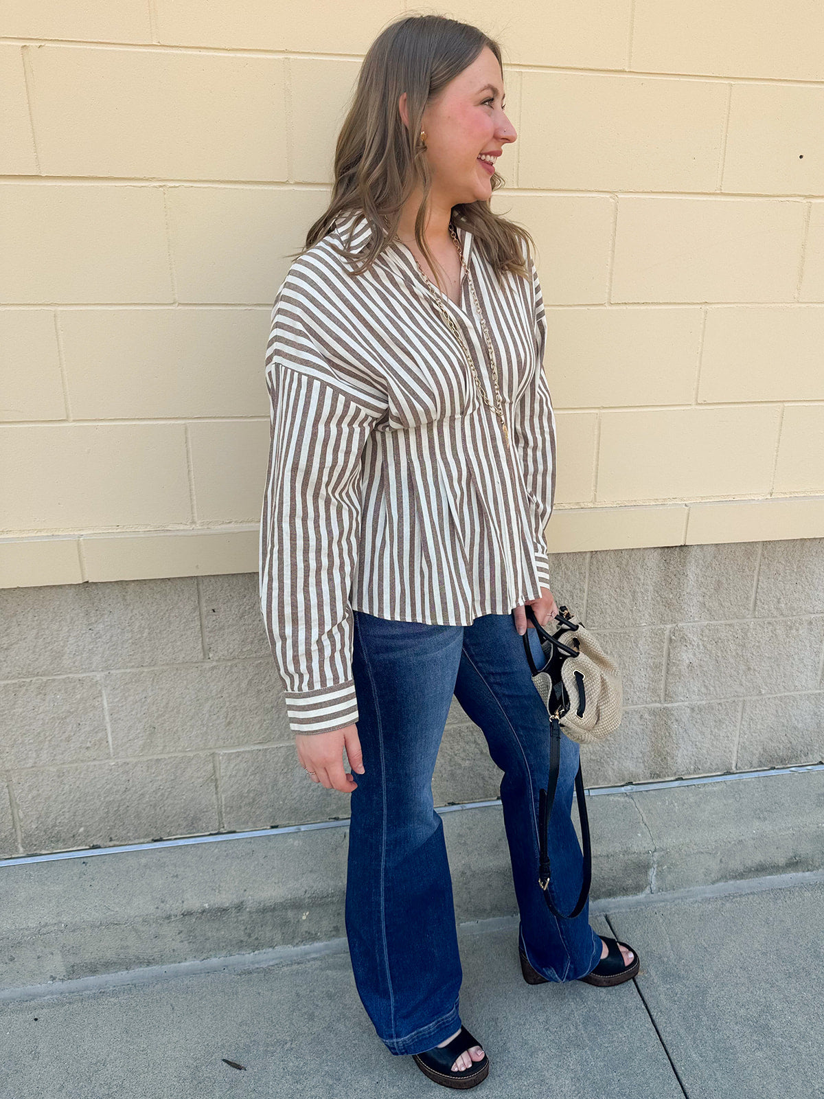 Taupe brown and cream striped long sleeve blouse with collared neckline and cinched waist