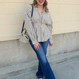 Taupe brown and cream striped long sleeve blouse with collared neckline and cinched waist