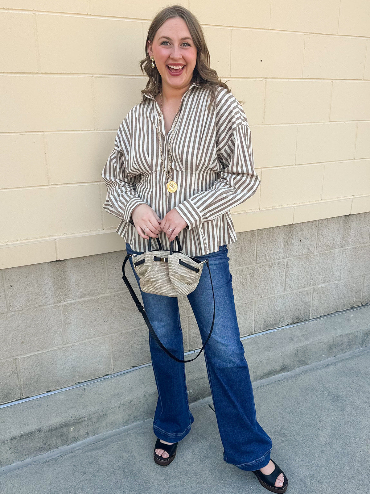 Taupe brown and cream striped long sleeve blouse with collared neckline and cinched waist