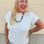 Cream short sleeve knit top with raised tonal stripe texture