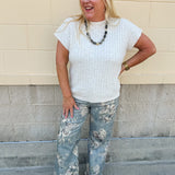 Cream short sleeve knit top with raised tonal stripe texture