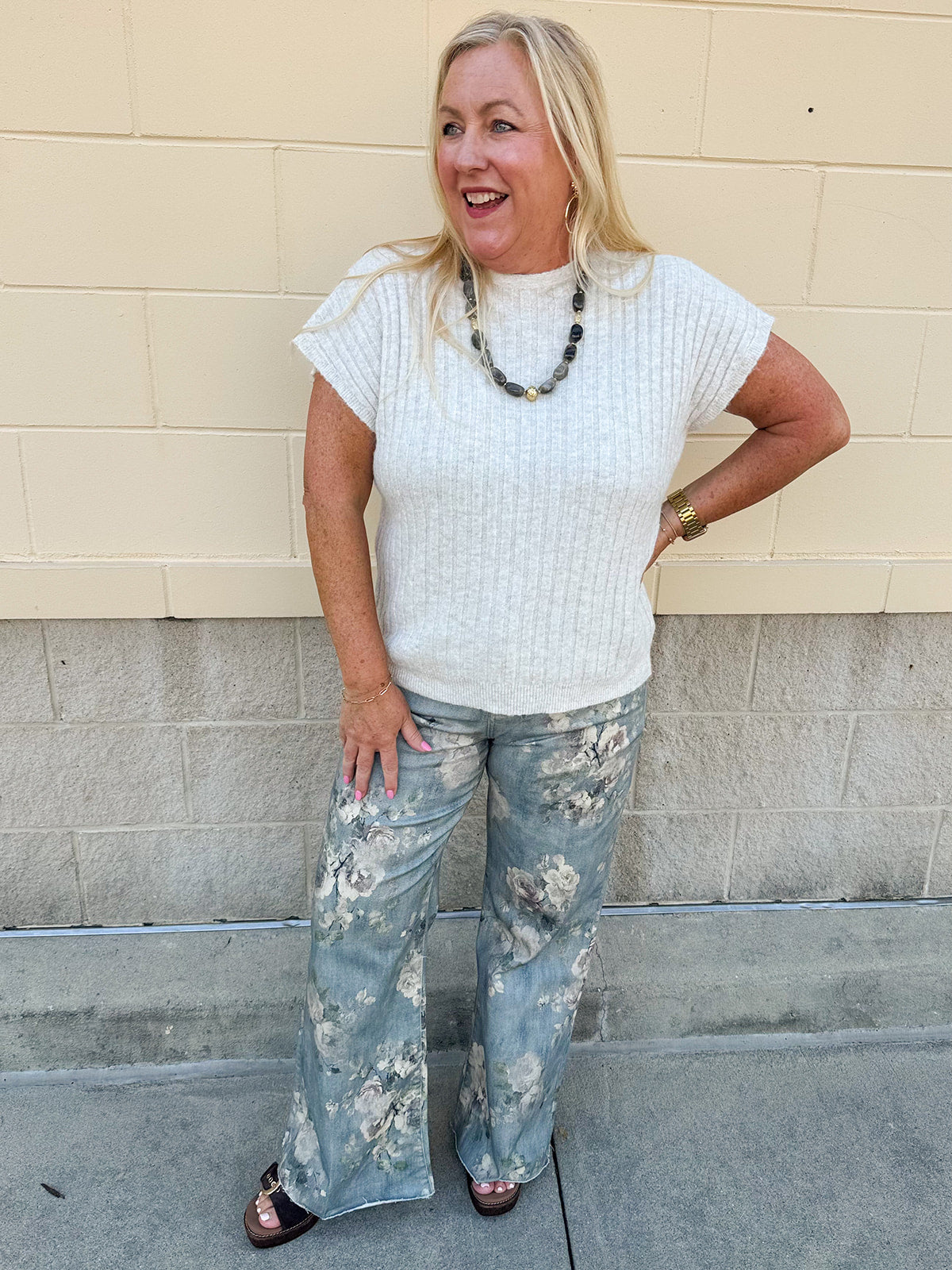 Cream short sleeve knit top with raised tonal stripe texture