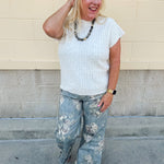 Cream short sleeve knit top with raised tonal stripe texture