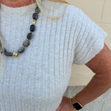 Cream short sleeve knit top with raised tonal stripe texture