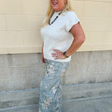 Cream short sleeve knit top with raised tonal stripe texture