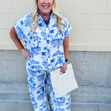 Crystal wearing the Feeling Chic Relaxed Fit Button Down Top – a lightweight, collared v-neck blouse with a button-down front and relaxed fit – styled for a casual summer outing.