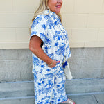 Crystal wearing the Feeling Chic Relaxed Fit Button Down Top – a lightweight, collared v-neck blouse with a button-down front and relaxed fit – styled for a casual summer outing.
