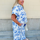 Crystal wearing the Feeling Chic Relaxed Fit Button Down Top – a lightweight, collared v-neck blouse with a button-down front and relaxed fit – styled for a casual summer outing.
