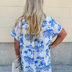 Crystal wearing the Feeling Chic Relaxed Fit Button Down Top – a lightweight, collared v-neck blouse with a button-down front and relaxed fit – styled for a casual summer outing.