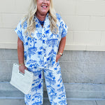 Crystal wearing the Feeling Chic Tassel Tie and Pom Pom Trim Pants – relaxed fit pants with a tassel drawstring waist and playful pom-pom trim, styled for a fun and effortless daytime look