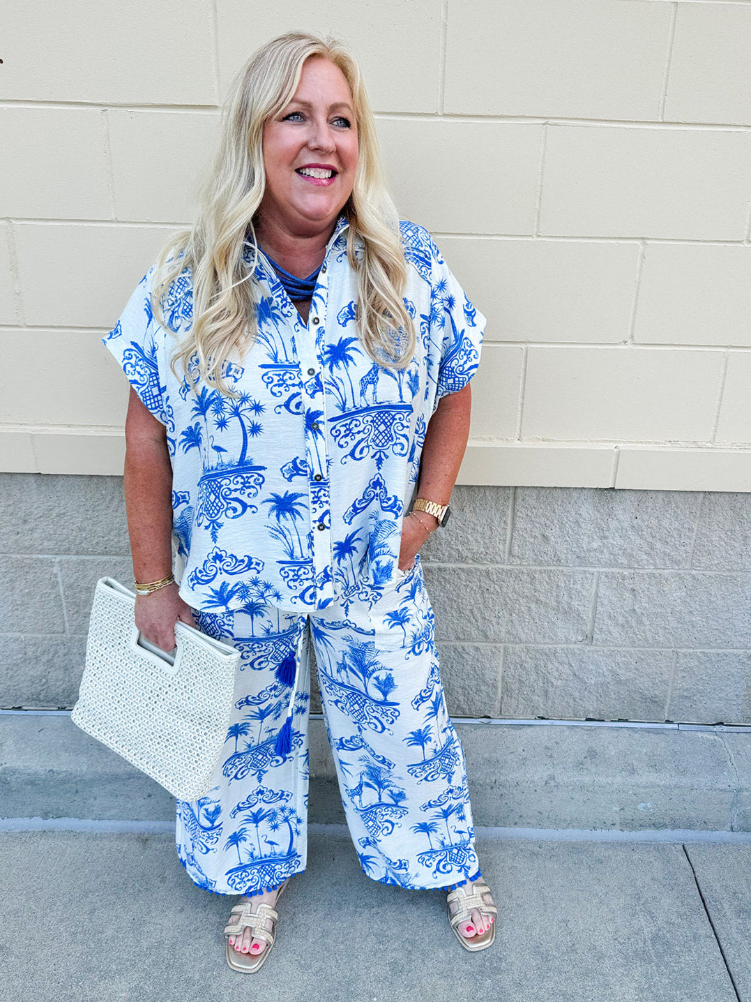 Crystal wearing the Feeling Chic Tassel Tie and Pom Pom Trim Pants – relaxed fit pants with a tassel drawstring waist and playful pom-pom trim, styled for a fun and effortless daytime look