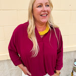 Garnet 3/4 sleeve collared blouse with cuffed sleeves, perfect for game day