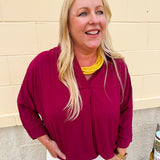 Garnet 3/4 sleeve collared blouse with cuffed sleeves, perfect for game day