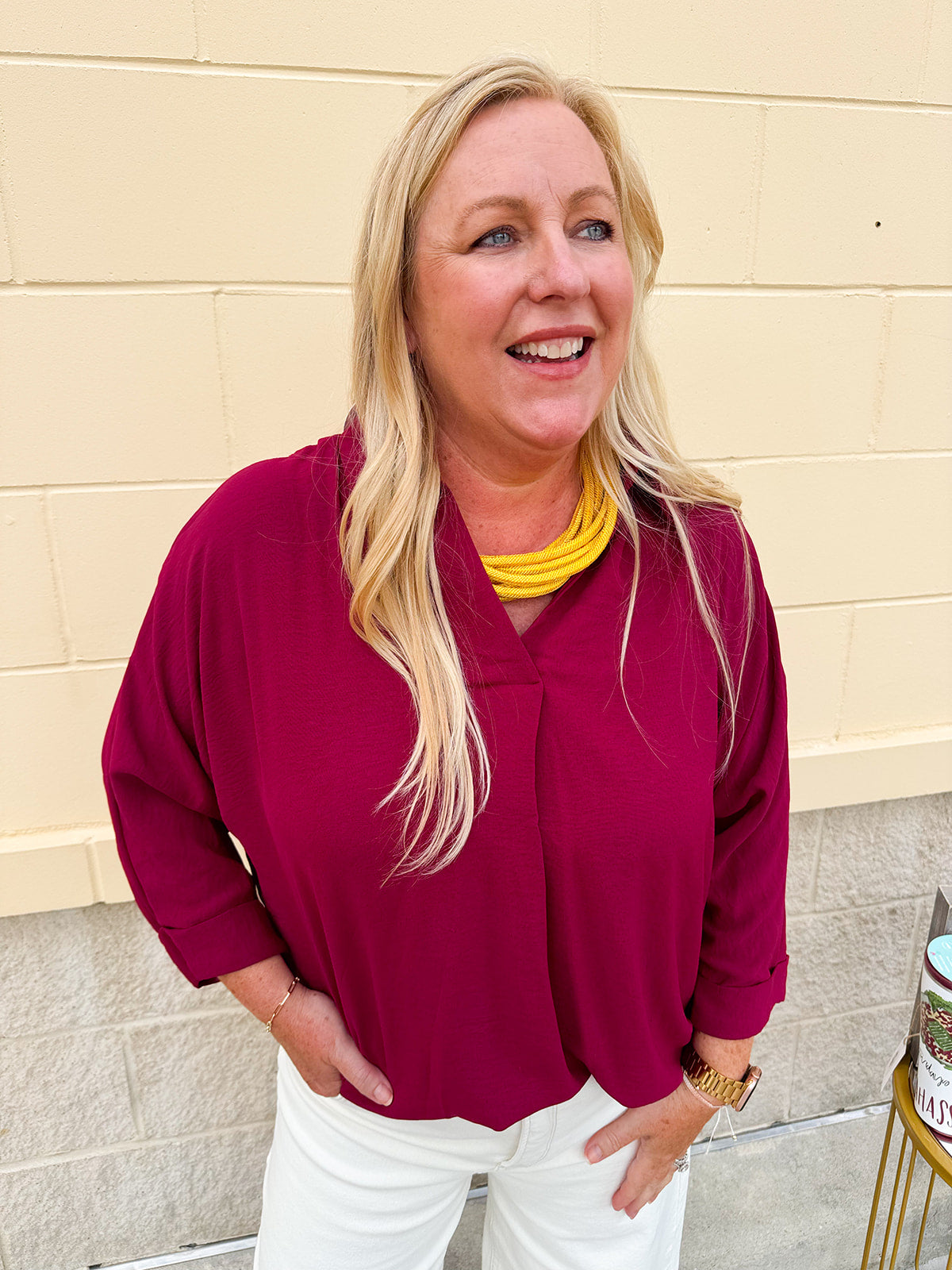 Garnet 3/4 sleeve collared blouse with cuffed sleeves, perfect for game day