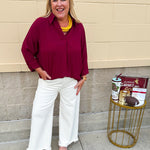 Garnet 3/4 sleeve collared blouse with cuffed sleeves, perfect for game day