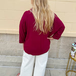 Garnet 3/4 sleeve collared blouse with cuffed sleeves, perfect for game day