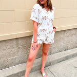 Garnet and gold bamboo pajama set with vintage-inspired images of Chief Osceola and Renegade. Set features a  button-front collared top and relaxed-fit shorts.