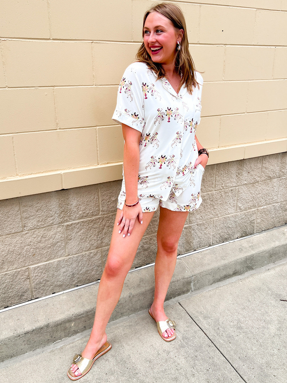 Garnet and gold bamboo pajama set with vintage-inspired images of Chief Osceola and Renegade. Set features a  button-front collared top and relaxed-fit shorts.