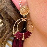 Gold double hoop earrings with garnet-threaded accents and gold stud top, perfect for adding subtle color and elegance.