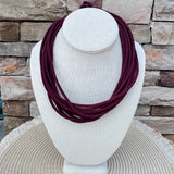 Thin garnet rope necklace with ball-and-eye closure