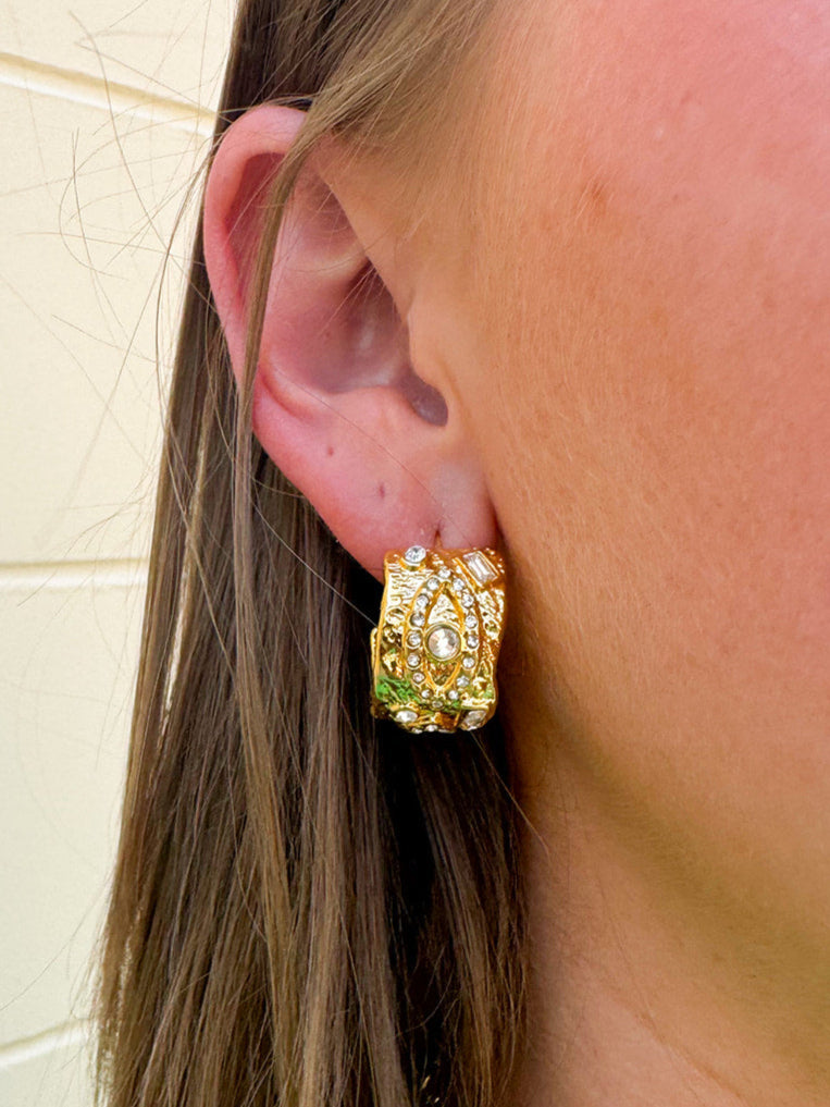 Gold thick mini hoop earrings with gem accents, displayed on neutral background