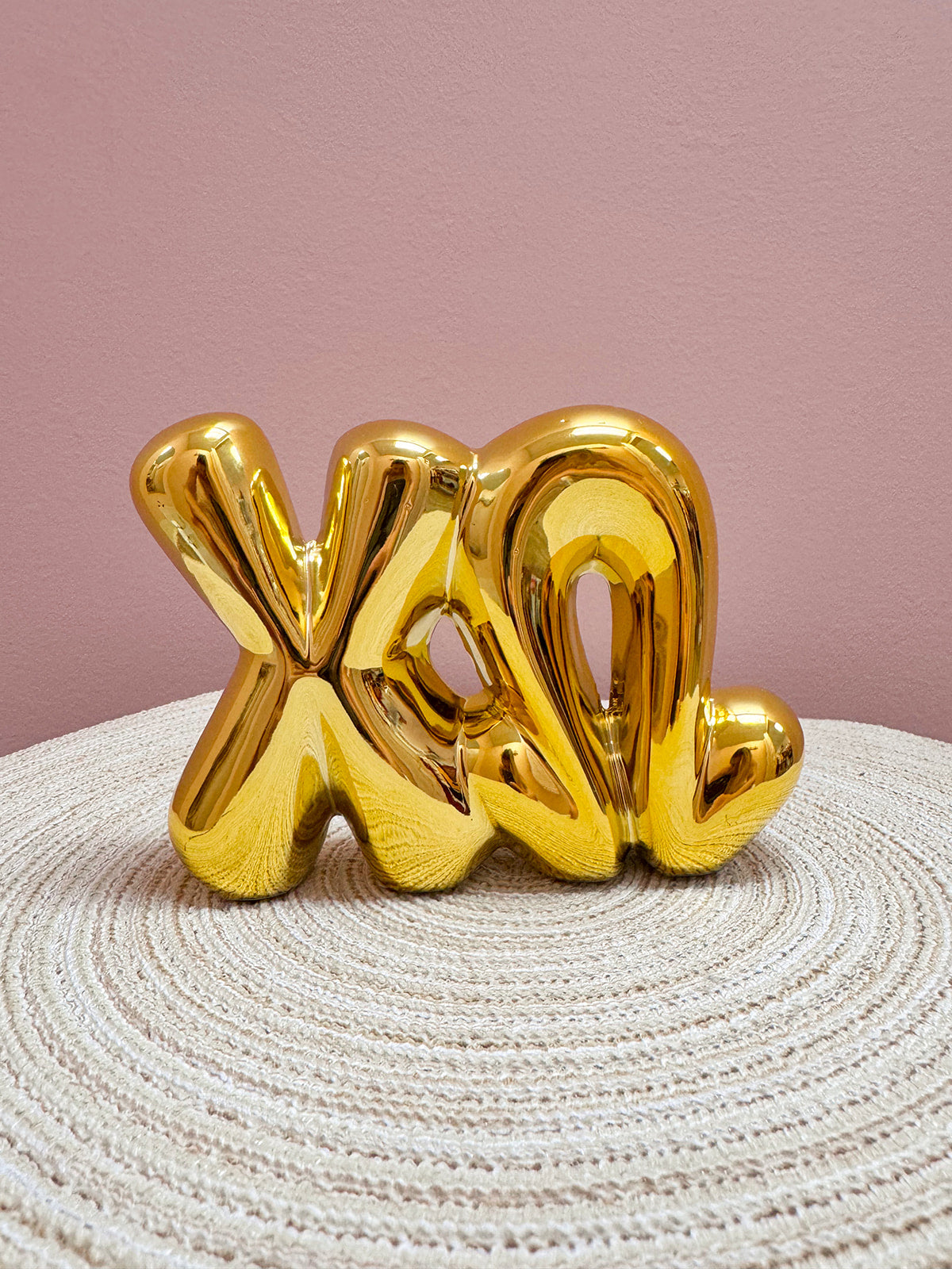 Gold Chi Omega bubble letter shelf décor with a polished metallic finish.