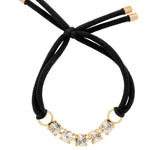 Gold-tone elastic hair tie with a row of shimmering round-cut crystals