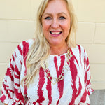 Hammered Metal Statement Necklace featuring organically shaped, textured metal accents on a 28-inch adjustable chain