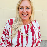 Hammered Metal Statement Necklace featuring organically shaped, textured metal accents on a 28-inch adjustable chain