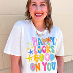 Cream graphic t-shirt with colorful Happy Looks Good On You design