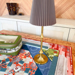  Harlow Brass Table Lamp with brass-finish base and taupe pleated shade, featuring cordless rechargeable LED lighting and touch control.