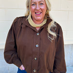 Hazelnut brown jacket with five front buttons, shoulder button accents, and a versatile high neckline